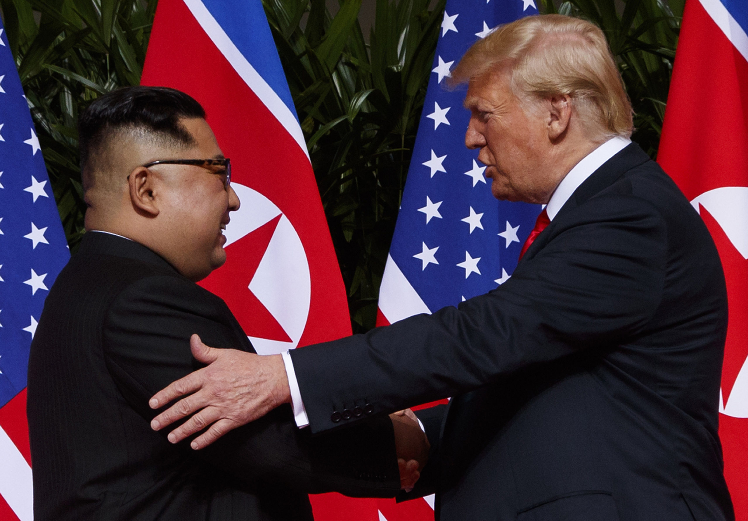 Photo of North Korea's Kim Jong Un and President Trump shaking hands