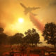 Photo of a 747 air tanker dropping fire retardant in Lakeport, Calif.