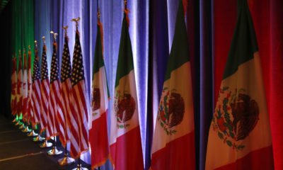 Photo of Canadian, U.S. and Mexican flags
