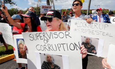 Photo of a crowd protesting outside the Broward County Supervisor of Elections office