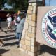 Photo of protesters walking outside the El Paso Processing Center