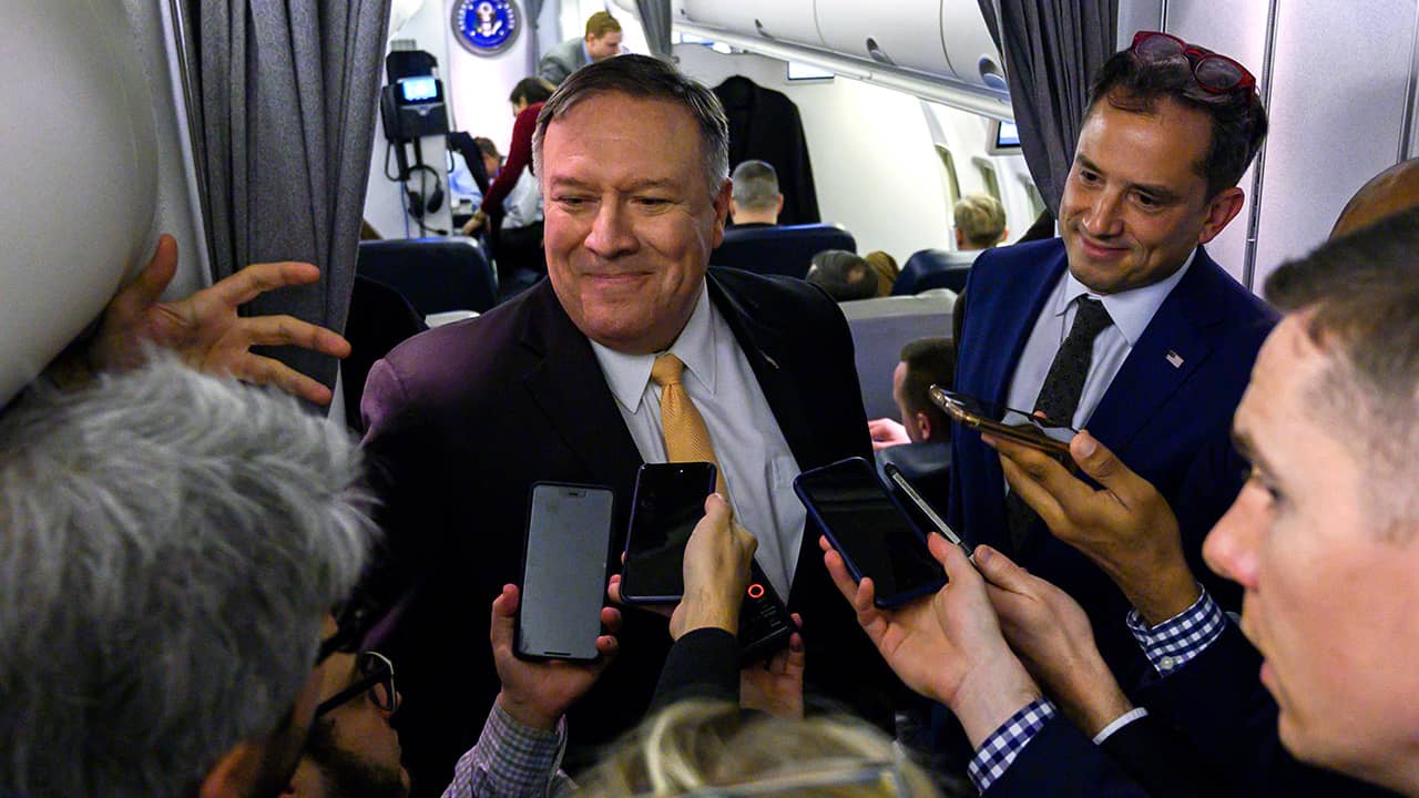 Photo of Mike Pompeo talking to reporters