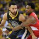 Photo of Golden State Warriors guard Stephen Curry and Toronto Raptors guard Kyle Lowry