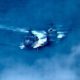 Photo of a Russian destroyer sailing close to the USS Chancellorsville in the Philippine Sea