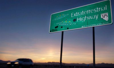 Photo of a car moving along the Extraterrestrial Highway