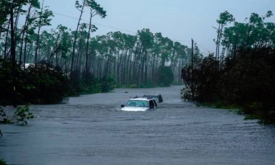 Photo of cars underway because of Hurricane Dorian's pounding rains