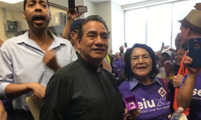 Photo Derek Smith and Dolores Huerta protesting