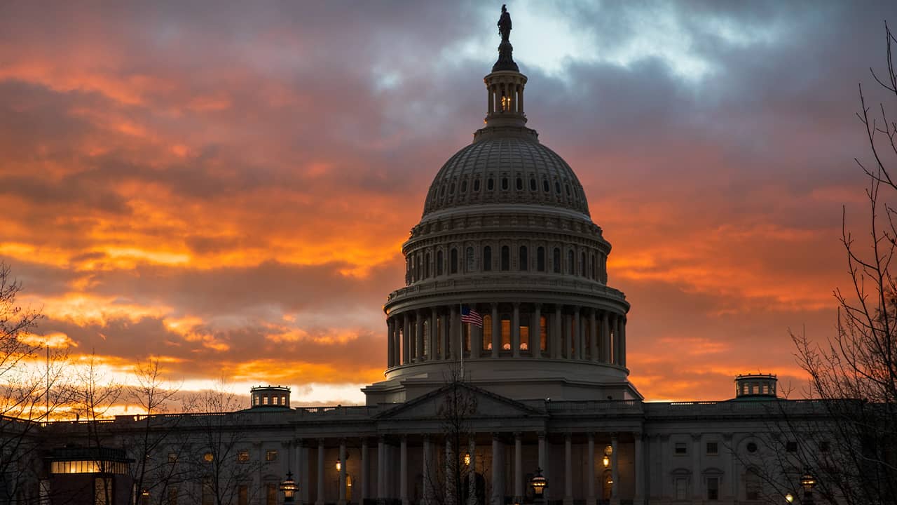 Photo of the Capitol at sunset in Washington