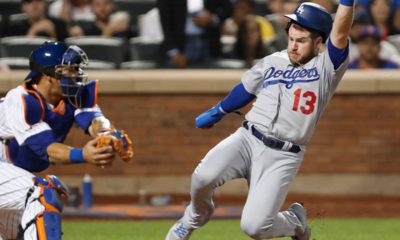 Photo of Max Muncy running home to score