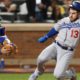 Photo of Max Muncy running home to score