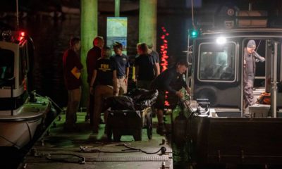 Photo of FBI carting away evidence taken from the scuba boat Conception