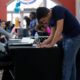 Photo of a man filling out a job application