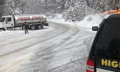 Photo of a diesel tanker truck spun out on snowy Highway 168 below Shaver Lake