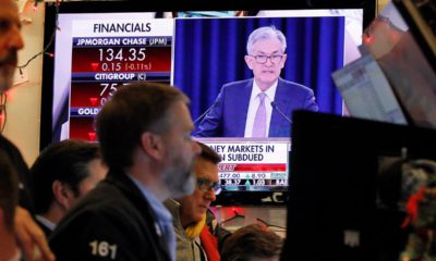 Photo of Jerome Powell on a television at the New York Stock Exchange