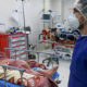 Photo of a nurse caring for a patient in Qom, Iran
