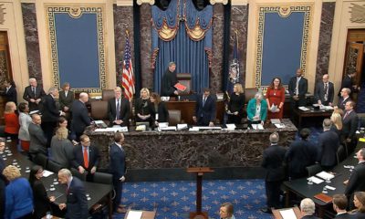 Photo of Chief Justice of the United States John Roberts arriving at the impeachment vote