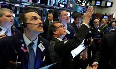 Photo of traders on the floor of the New York Stock Exchange