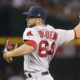 Photo of Boston Red Sox relief picture Marcus Walden delivering a pitch to the plate.