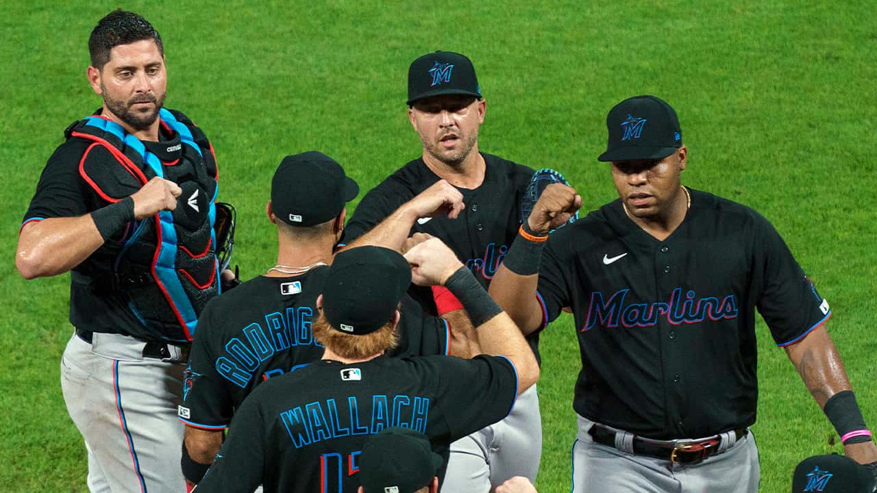Image of Miami Marlins celebrating a victory in violation of MLB's coronavirus protocols