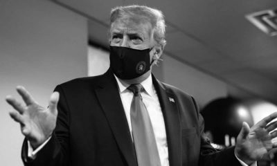 Black and white image of President Donald Trump wearing a mask